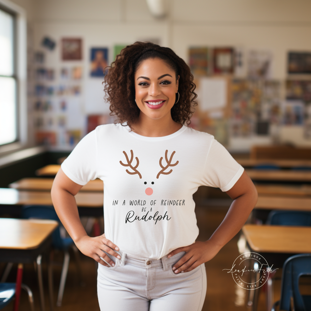IN A WORLD OF REINDEER BE A RUDOLPH - Christian Unisex T-shirt