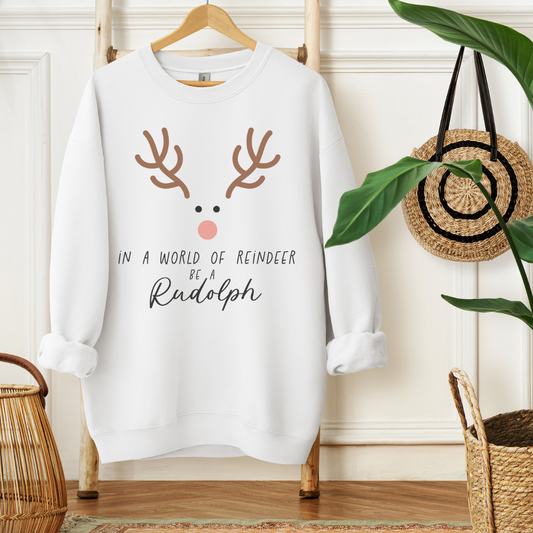 IN A WORLD OF REINDEER BE A RUDOLPH - Christian Unisex Sweater