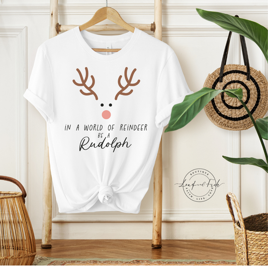 IN A WORLD OF REINDEER BE A RUDOLPH - Christian Unisex T-shirt
